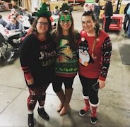 KRS team members in ugly sweaters at the warehouse holiday party